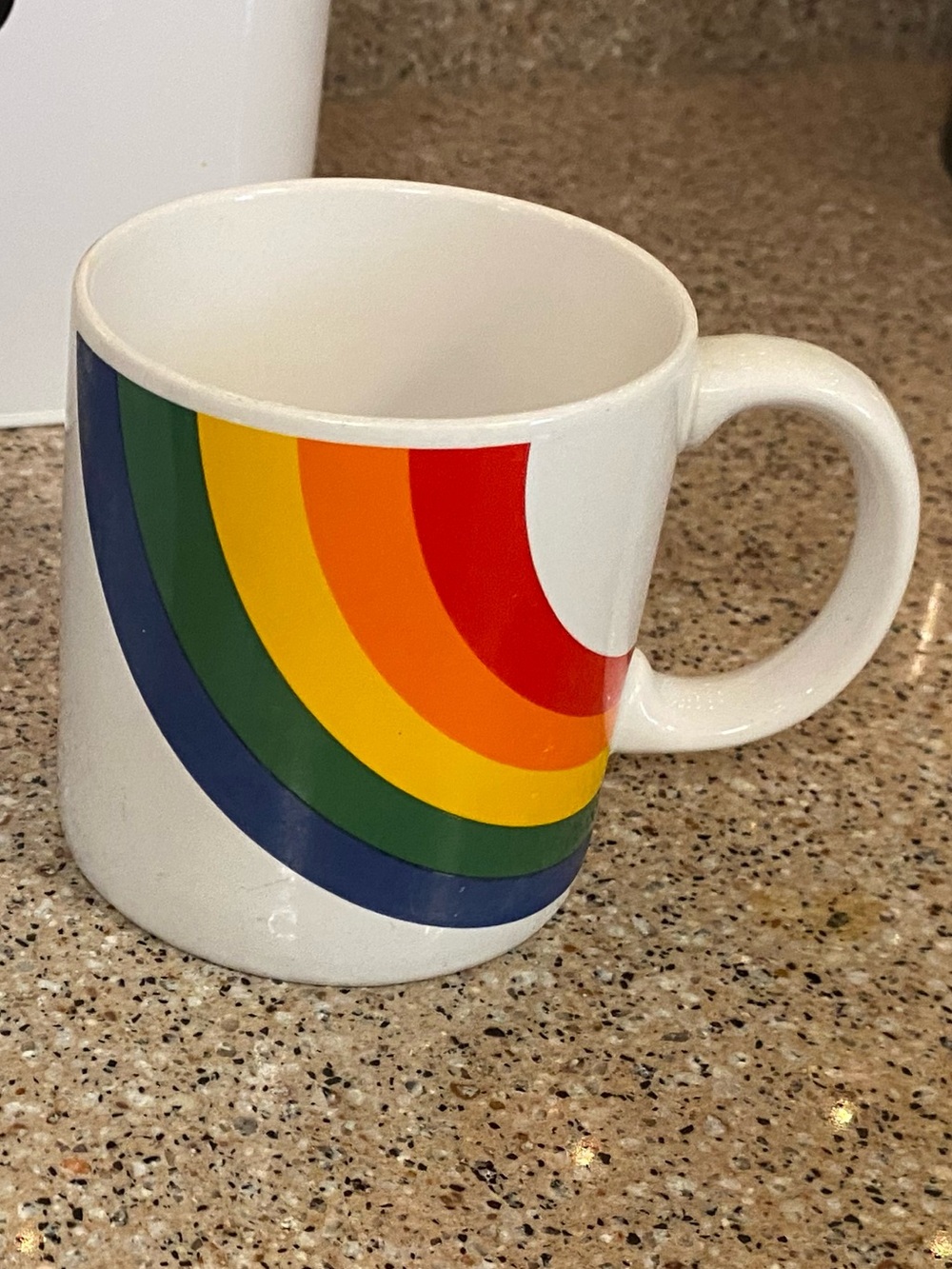 White Ceramic Mug with Rainbow Stripe Design. Vintage, early 1980s.